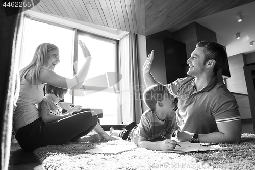 Image of young couple spending time with kids
