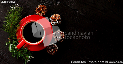 Image of Cup of coffee and pinecones
