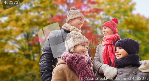 Image of happy family over autumn park background