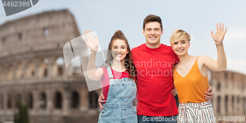 Image of happy friends hugging over coliseum background