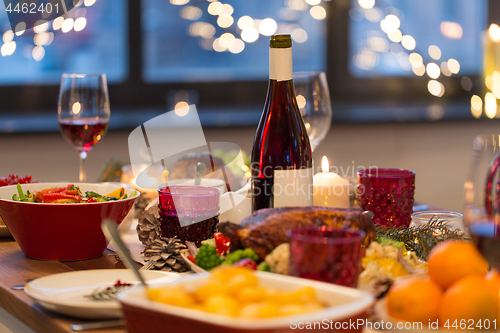 Image of food and drinks on christmas table at home