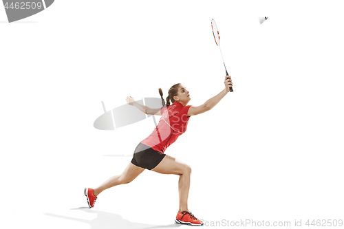 Image of Young woman playing badminton over white background