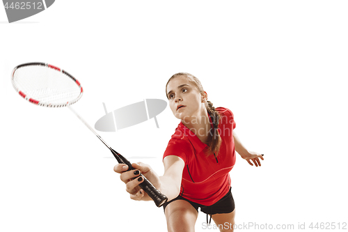 Image of Young woman playing badminton over white background