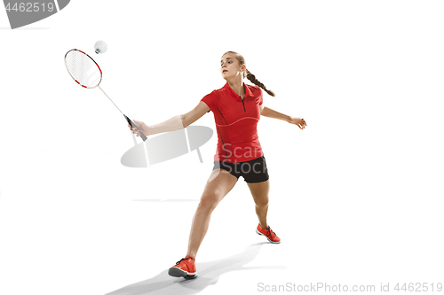 Image of Young woman playing badminton over white background