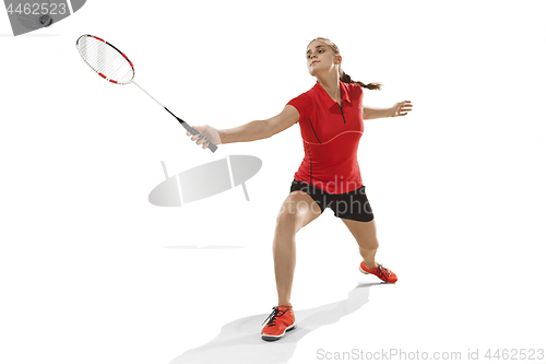 Image of Young woman playing badminton over white background