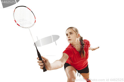 Image of Young woman playing badminton over white background