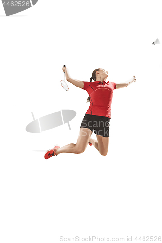 Image of Young woman playing badminton over white background