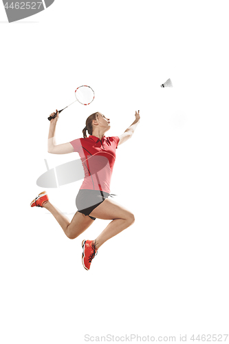 Image of Young woman playing badminton over white background