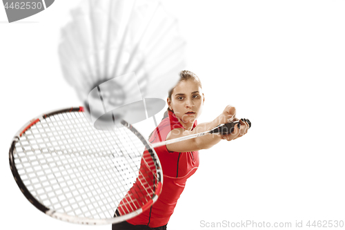 Image of Young woman playing badminton over white background