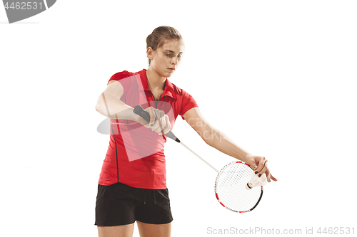 Image of Young woman playing badminton over white background