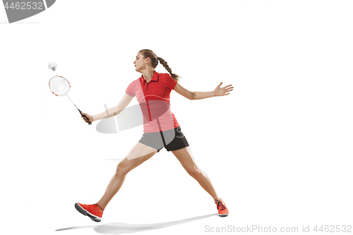 Image of Young woman playing badminton over white background