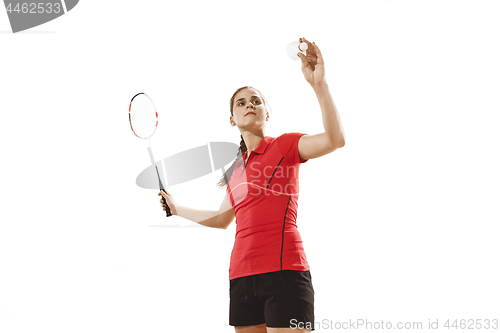 Image of Young woman playing badminton over white background