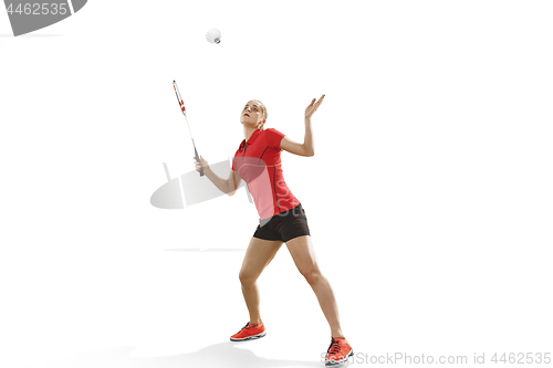 Image of Young woman playing badminton over white background