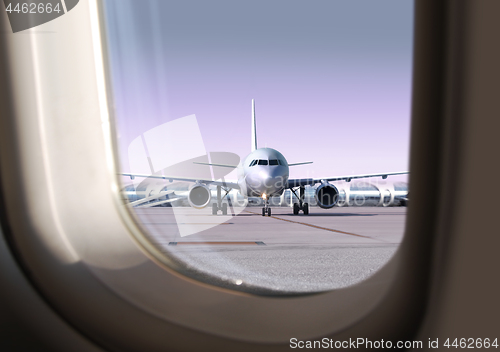 Image of airport that view through a window