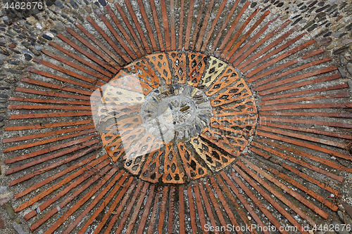 Image of Cobble concentric mosaic. Patterned floor walkway in the park.