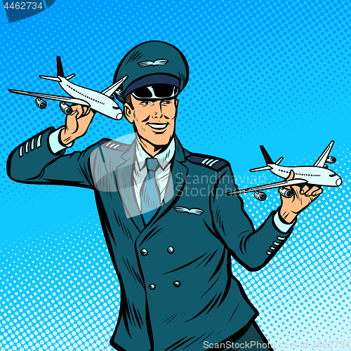 Image of male airplane pilot. Model aircraft in hand