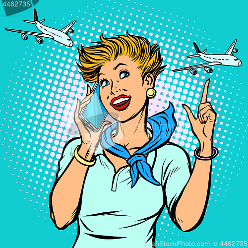 Image of stewardess at the airport talking on the phone