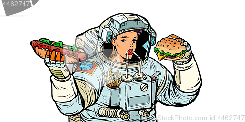 Image of Woman astronaut eats. Cola, hot dog and Burger fast food. Isolat