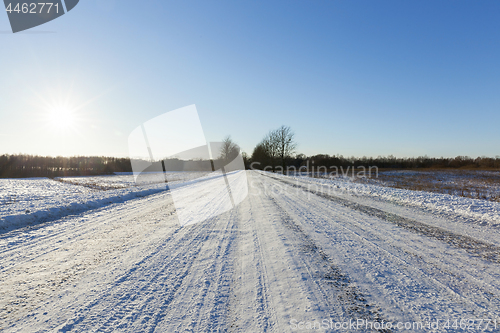 Image of traces of the car on snow