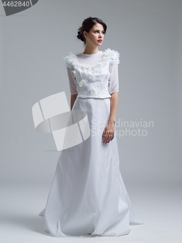 Image of Portrait of beautiful young women in wedding dress