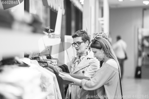 Image of best friend shopping in big mall