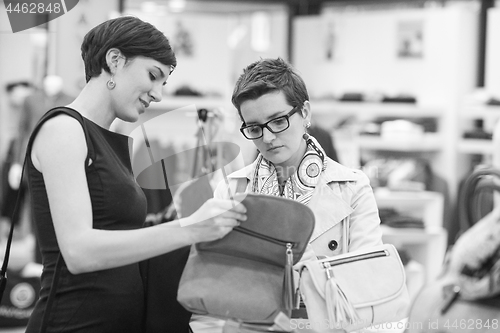 Image of best friend shopping in big mall