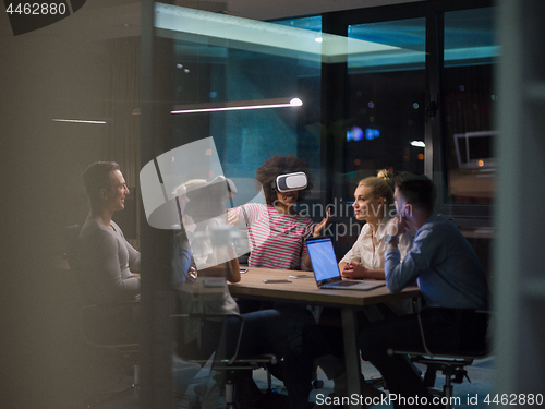 Image of Multiethnic Business team using virtual reality headset