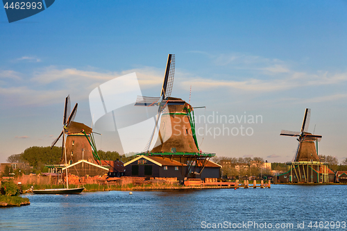 Image of Windmills at Zaanse Schans in Holland in twilight on sunset. Zaa