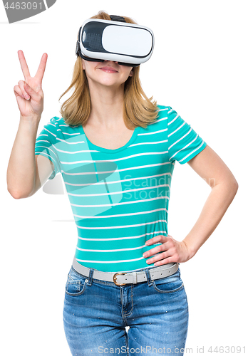 Image of Woman looking in VR glasses