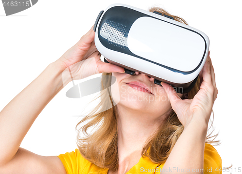 Image of Woman looking in VR glasses