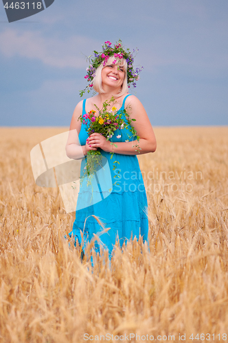 Image of Woman at wheat meadow