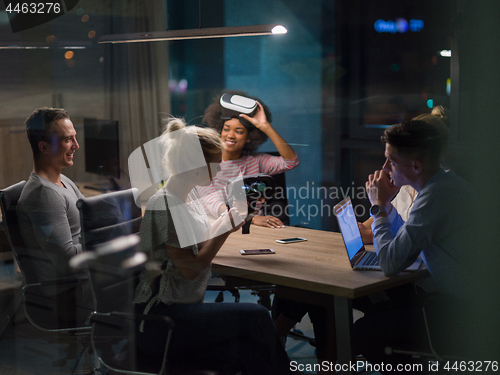 Image of Multiethnic Business team using virtual reality headset