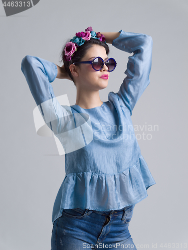 Image of woman posing in fashionable clothes and sunglasses