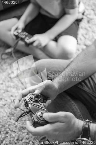 Image of Happy family playing a video game