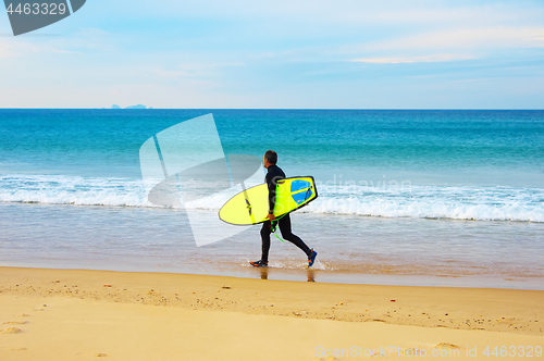 Image of Surfer on the beach