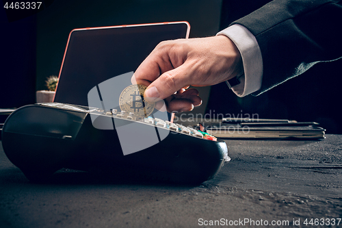 Image of Bitcoin, credit card and POS-terminal