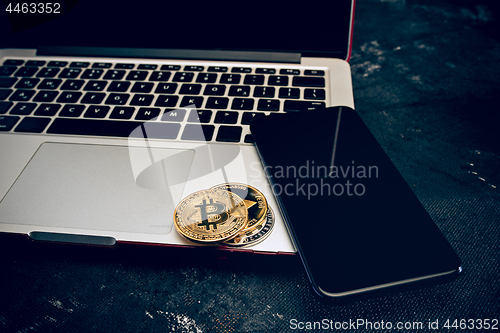 Image of The golden bitcoin on keyboard