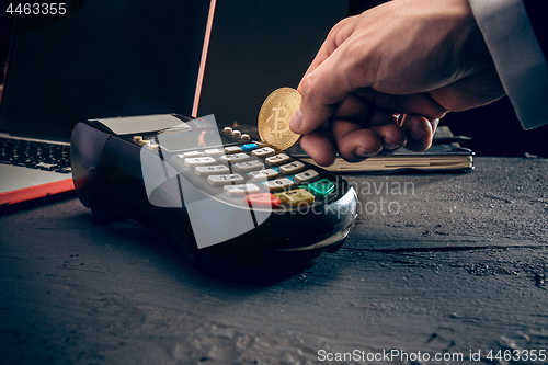 Image of Bitcoin, credit card and POS-terminal