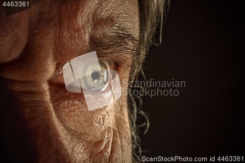 Image of Close-up view on the eye of senior man.