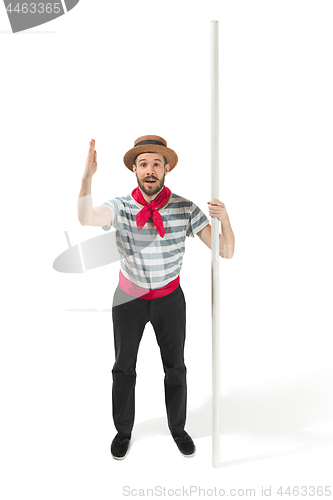 Image of Caucasian man in traditional gondolier costume and hat