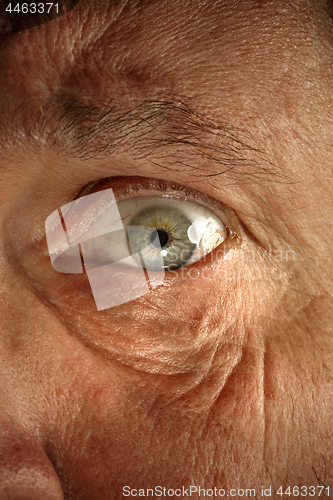 Image of Close-up view on the eye of senior man.