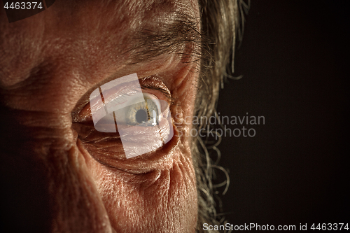 Image of Close-up view on the eye of senior man.