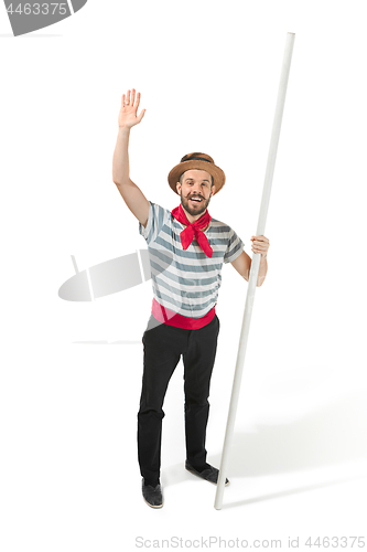 Image of Caucasian man in traditional gondolier costume and hat