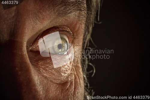 Image of Close-up view on the eye of senior man.