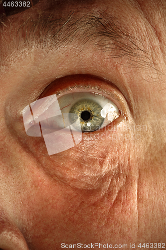 Image of Close-up view on the eye of senior man.