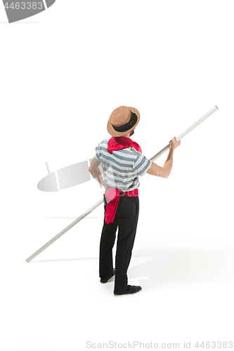 Image of Caucasian man in traditional gondolier costume and hat