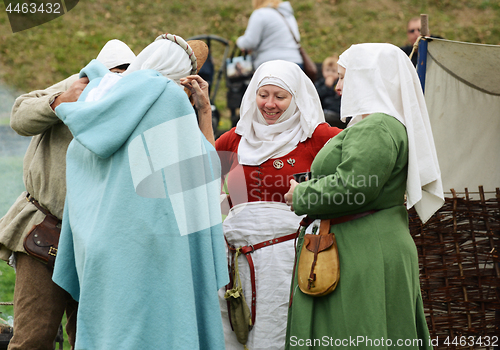 Image of Women in authentic Medieval dress and wimples