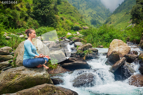 Image of Woman in Padmasana outdoors