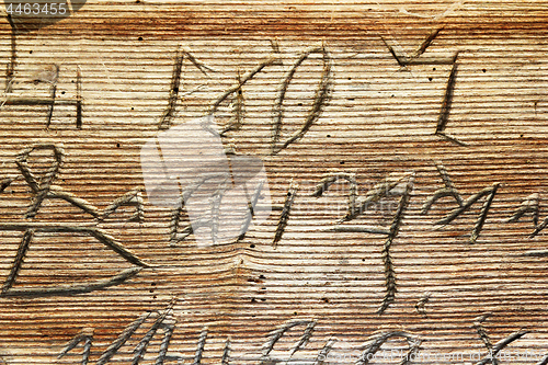 Image of cyrillic writings on old wooden church 