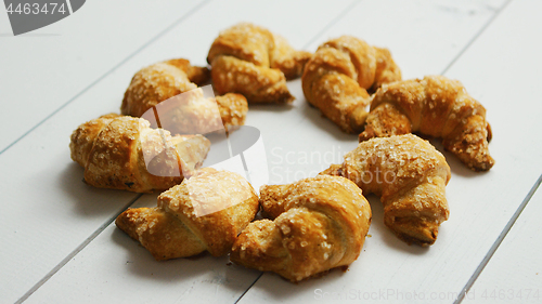 Image of Fresh croissants laid in circle